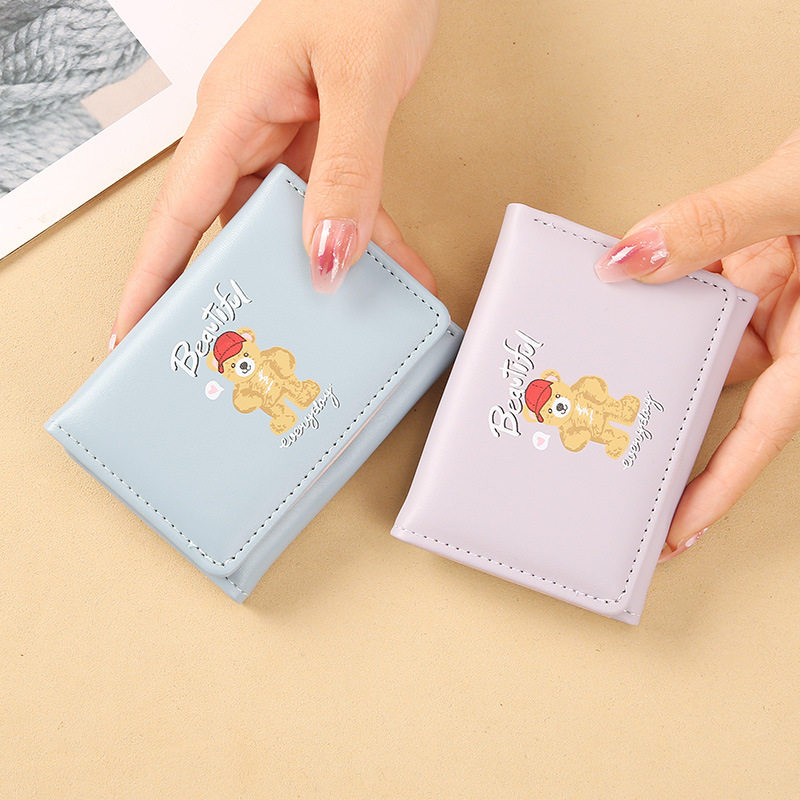 娇雪兰 ins女式短款学生跨境钱包外贸折叠三折时尚百搭动漫手拿包