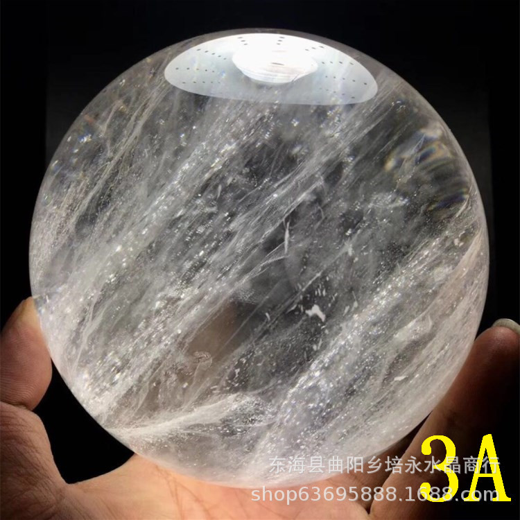Earth's Treasure — Natural Clear Quartz Sphere