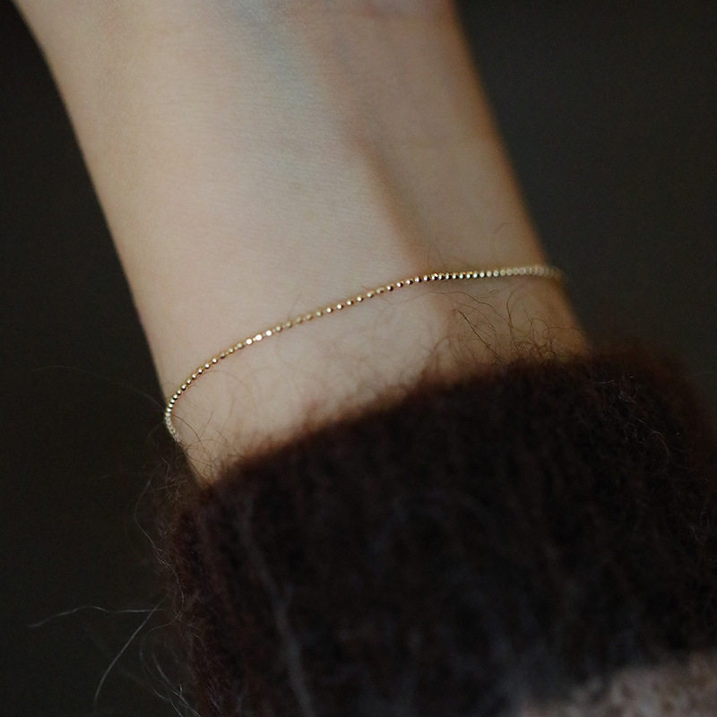 14K gold Faceted round bead bracelet Adjustable