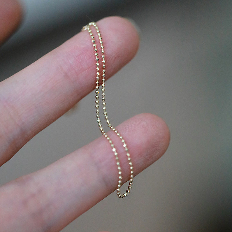 14K gold Faceted round bead bracelet Adjustable