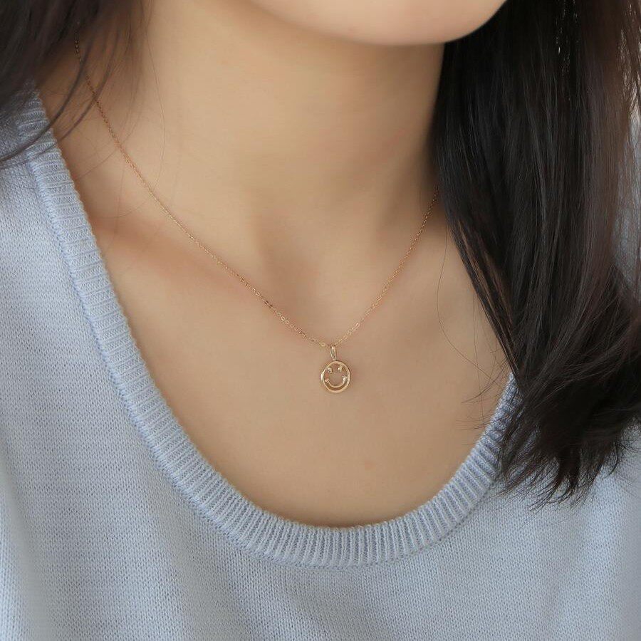 9K gold hollowed-out smiley face pendant
