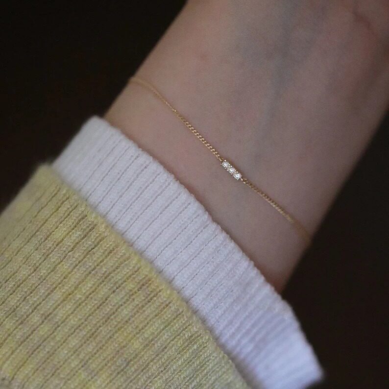 14K gold bracelet with three diamonds