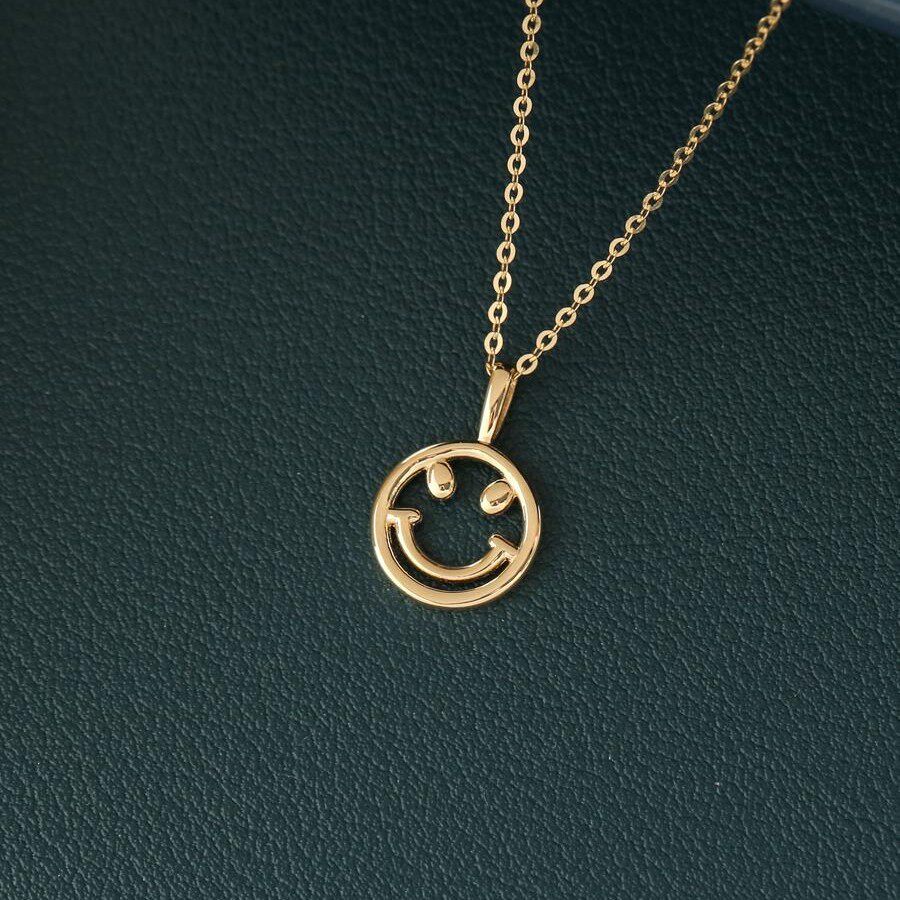 9K gold hollowed-out smiley face pendant
