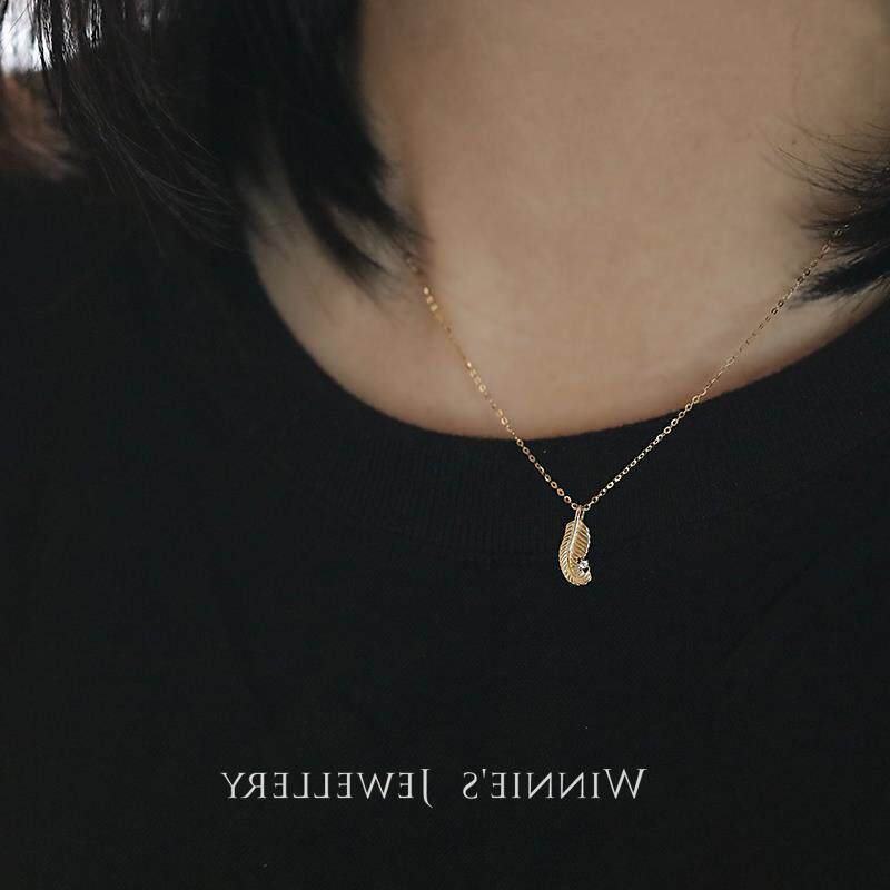 9K gold curly feather pendant