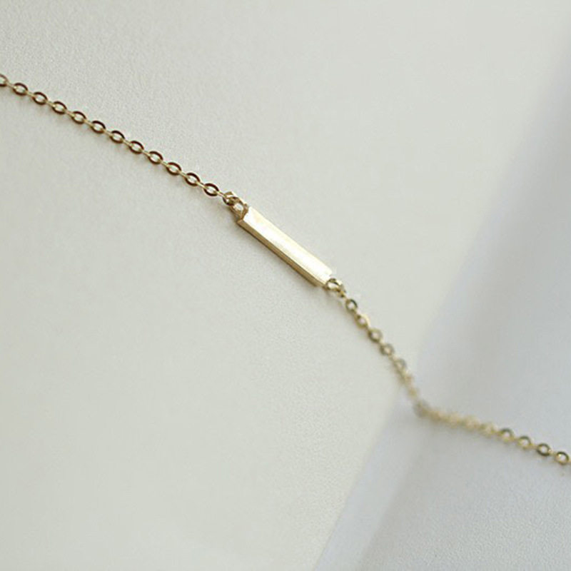 14K gold straight bar bracelet