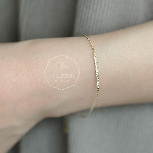 14K gold single-row diamond bracelet