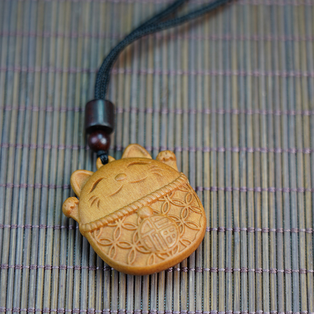 Thunderstruck Peach Wood Maneki-Neko Pendant - Natural Evil-Warding, Wealth-Attracting Talisman, Unisex Mascot