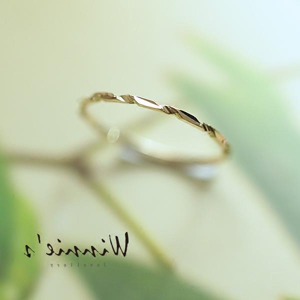 9/14K gold Twisted cut surface ring