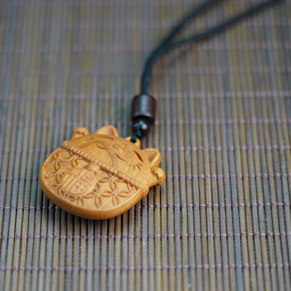 Thunderstruck Peach Wood Maneki-Neko Pendant - Natural Evil-Warding, Wealth-Attracting Talisman, Unisex Mascot