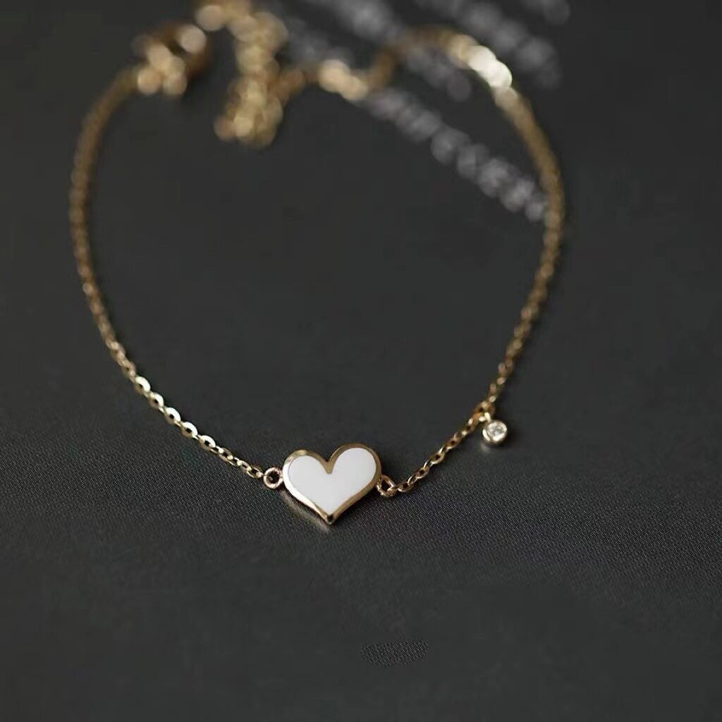 14K gold diagonal heart bracelet
