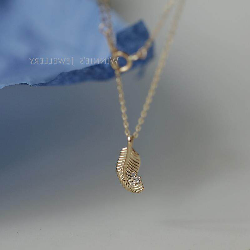 9K gold curly feather pendant