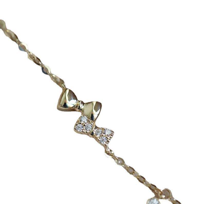 14K gold double bow bracelet