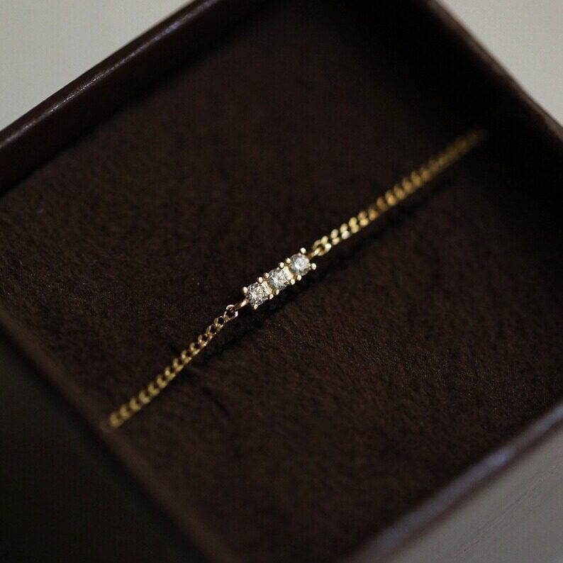 14K gold bracelet with three diamonds