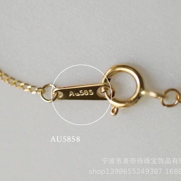 14K gold bracelet with three diamonds