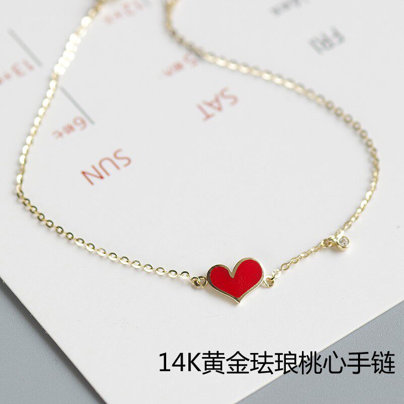 14K gold diagonal heart bracelet