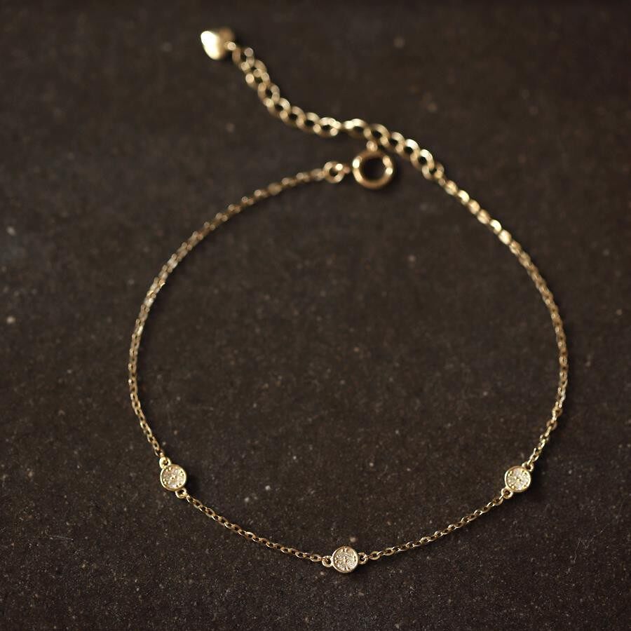 14K gold Three small round bracelets