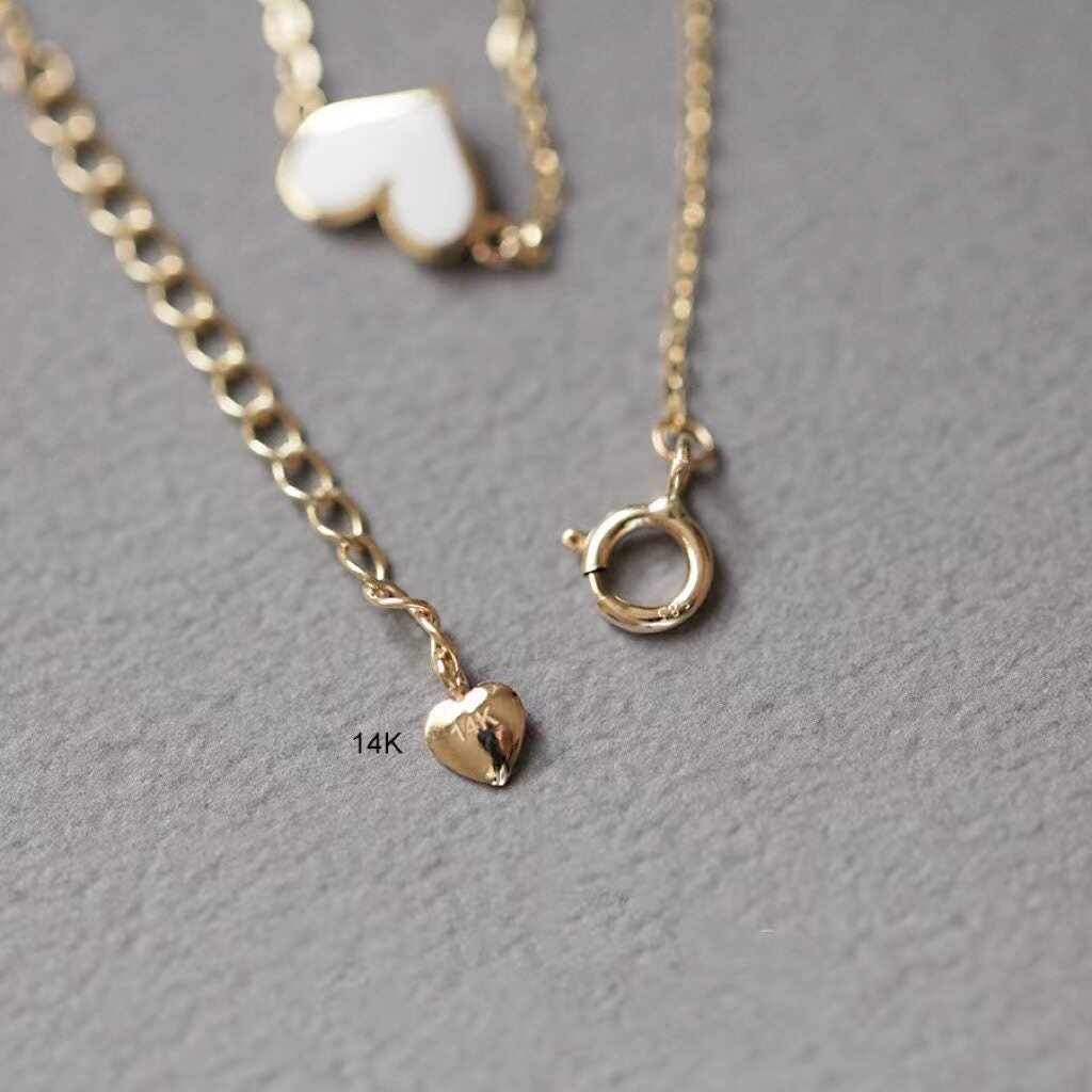 14K gold diagonal heart bracelet