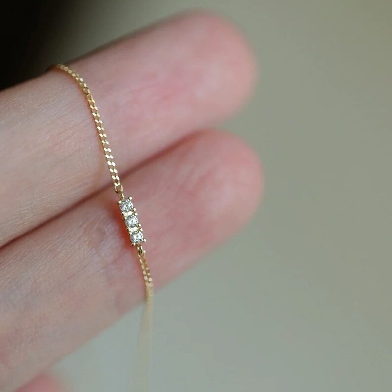 14K gold bracelet with three diamonds