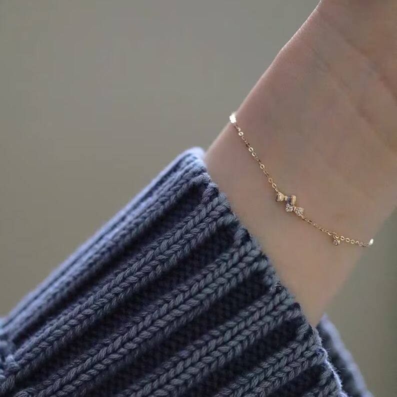 14K gold double bow bracelet