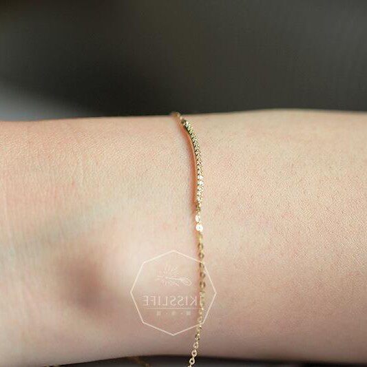 14K gold single-row diamond bracelet