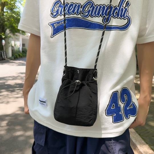 夏天夏季迷你小包包女2024新款时尚抽绳斜挎包白色单肩钥匙包