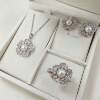 Natural freshwater pearl flower jewelry set Zircon inlaid pearl necklace earrings stud ring three-piece set