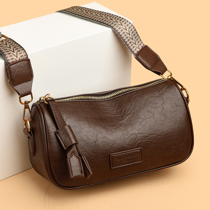 今年流行波士顿包包夏季2025新款小众设计师复古单肩斜挎包枕头包,淘宝优惠券,粉丝福利购,淘宝优惠卷