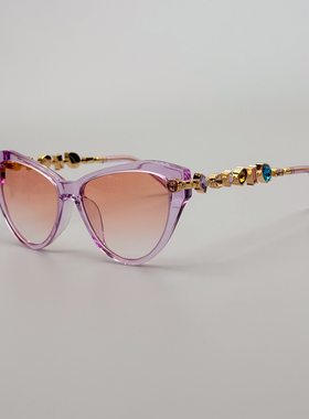 小香风镶钻猫眼显瘦防紫外线墨镜