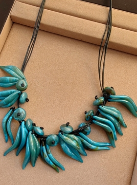 欧美风蓝色复古民族风亚克力毛衣