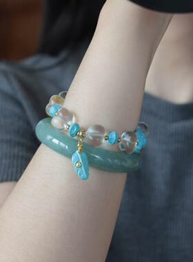 压电白水晶屁桃 搭配菱镁矿无相佛 百香籽 树叶 手串