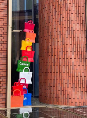 玻璃纤维剪影购物人物雕塑商场步行街拍照创意袋子大型卡通落地摆