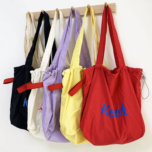 韩版新款字母印花包包女大容量尼龙单肩包休闲百搭便携抽绳托特包 - 图0