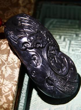 貔貅手把件新疆墨玉籽料和田玉