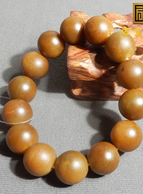 新疆玉且末山流水红糖玉圆珠手串