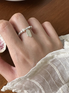 s925纯银珍珠幸运吊牌碎银子戒指弹力绳