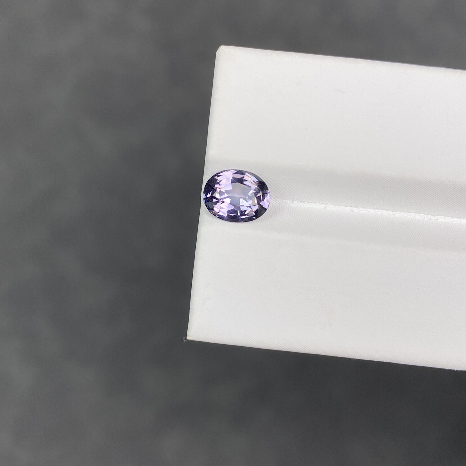 1.6 carat natural metallic purple spinel oval