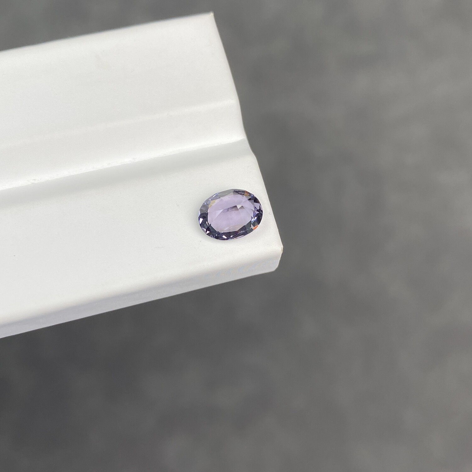 1.6 carat natural metallic purple spinel oval