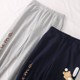 Elastic waisted bear print ankle-length sweatpants