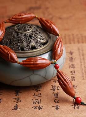 一心向佛雕刻把玩橄榄核手串