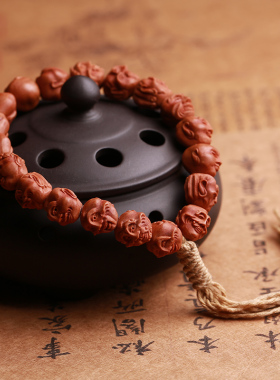 手工雕刻男女龙纹桃核手串