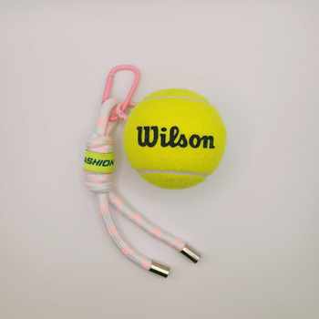 ຖົງ tennis ສີບົວ pendant tennis pendant keychain peripheral ສ້າງສັນປີໃຫມ່ຂອງຂວັນວັນເດືອນປີເກີດງາມເຊືອກສິນລະປະເຄື່ອງປະດັບ