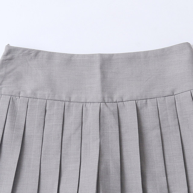 Summer ຕ້ານການເປີດເຜີຍແລະ slimming pleated skirt ສັ້ນ