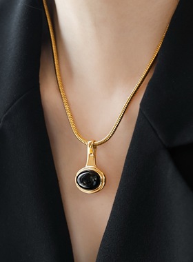 时髦粗蛇骨吊坠金色毛衣链黑玛瑙