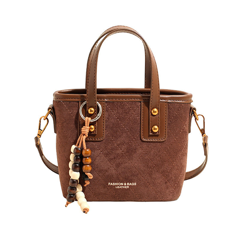 今年流行爆款包包女 2025新款秋冬复古小众菱格斜挎包手提水桶包N,淘宝优惠券,粉丝福利购,淘宝优惠卷