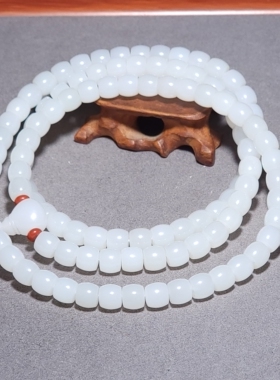 L031606 新疆的猫61.1克直径7-6mm脂粉浓郁羊脂白玉直切108长链