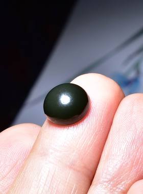 细润纯黑油亮的黑青籽料圆戒面