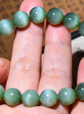 新疆的猫JJ121805  30.3克，10mm老坑俄料碧玉猫眼圆珠手链