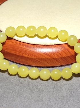 L010502 32.4克，直径10mm色调油亮颜色纯正的若羌鸡油黄圆珠手链