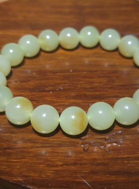 YQ032403新疆的猫28.4克10mm色调油亮颜色纯正且末黄口玉圆珠手链