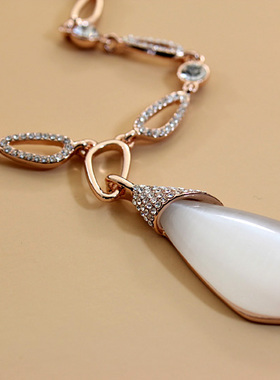 超闪长款几何猫眼石装饰品毛衣链